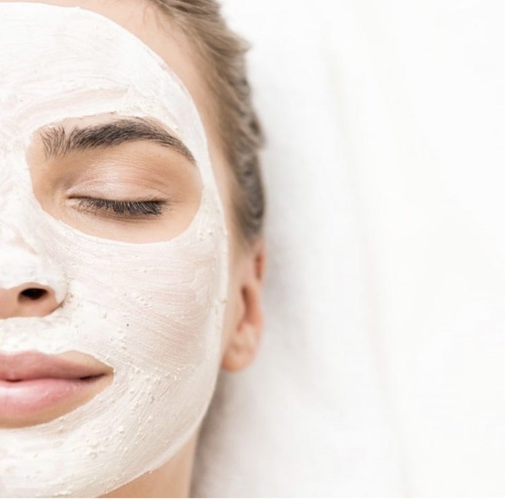 Young woman relaxing after applying facial mask | Mandalyn Academy in American Fork, UT