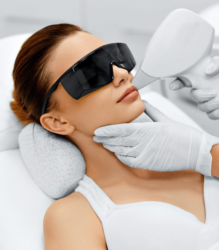 Woman Getting Laser treatments by Wearing Safety Goggles | Mandalyn Academy in American Fork, UT